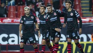 Jugadores de Tijuana celebran una anotación en la J4 del C2018