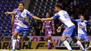 Hugo Rodríguez festeja un gol con Puebla en el C2018