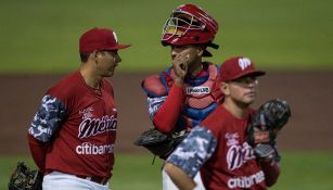 Jugadores de los Diablos Rojos durante el partido