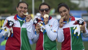 Román, Valencia y Vázquez, con la medalla de oro en los JCC