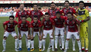 Once titular del 'Tibu' se toma la fotografía antes del juego