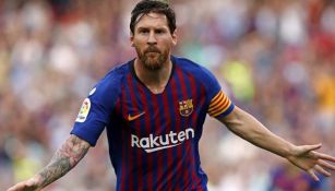 Messi celebra una anotación con el Barça en España