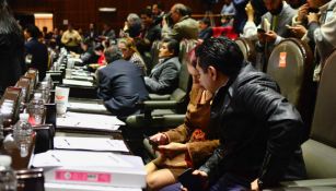 Diputados se preparan para iniciar una sesión 