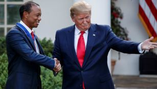 Trum y Tiger en la entrega de la Medalla Presidencial de Libertad 