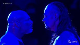 Momento en que Goldberg y Undertaker se encuentran en el ring