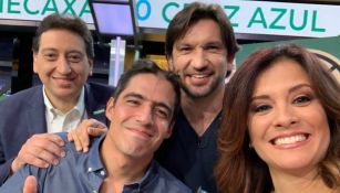 Andrés Vaca y sus compañeros sonríen tras cobrar la apuesta