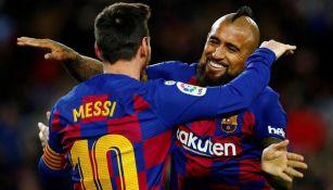 Messi y Vidal festejan gol 