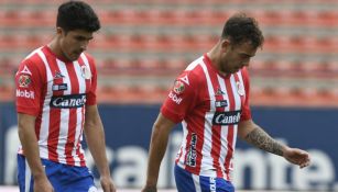 Jugadores de Atlético en lamento