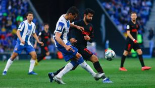 Acción de un juego entre Espanyol y Atlético de Madrid