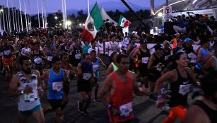 Runners pasan por el Olímpico Universitario en la última edición del Maratón