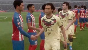 Jugadores de América y Chivas se saludan antes de un juego de eliga MX