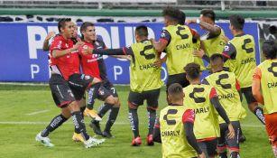 Jugadores del Atlas celebran un gol