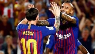 Messi y Vidal en un partido