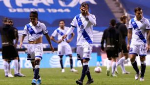 Jugadores de Puebla se lamentan tras un juego 
