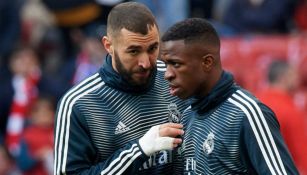 Vinicius y Benzema antes de un partido