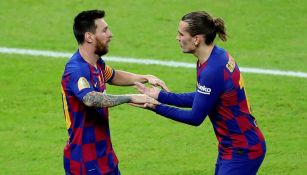 Messi y Griezmann durante un partido con Barcelona