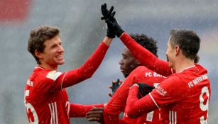 Thomas Müller y Robert Lewandowski celebrando un gol conseguido