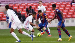 Lionel Messi en un partido entre el Barcelona y el Real Madrid