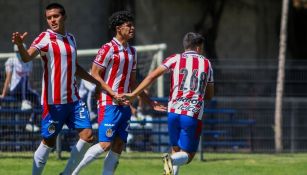 Carlos Salcido y Christo Vela festejan un gol del Rebaño 