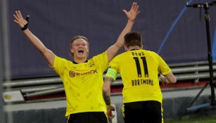 Haaland festejando un gol junto a Marco Reus