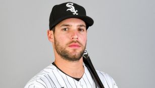  Luis González de los White Sox posa con bat