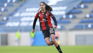 Alison González en un partido con el Atlas