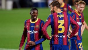 Dembélé y Piqué en un partido