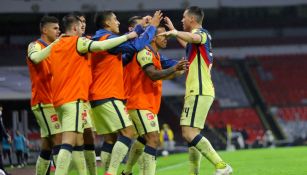 Jugadores del América celebran gol vs Portland