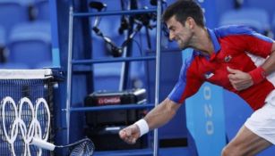 Novak Djokovic estrellando su raqueta