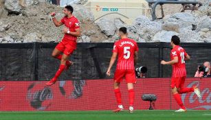 Jugadores del Sevilla en festejo de gol
