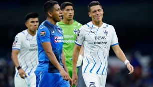 Héctor Moreno y Luis Romo en un partido de Liga MX