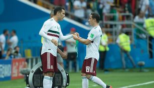 Márquez y Guardado en un partido de México