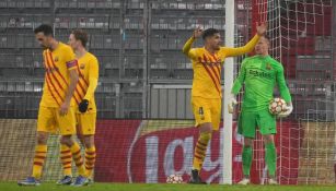 Jugadores del Barcelona reaccionan frente al Bayern Munich