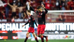 Jugadores de Xolos festejan un gol