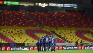 Jugadores de Querétaro previo a un partido