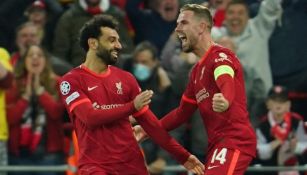 Salah y Henderson celebrando un gol a favor