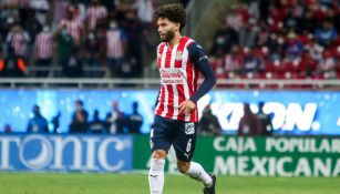 César Huerta durante un partido con Chivas