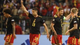 Jugadores de Bélgica celebran ante Polonia