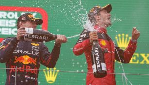 Verstappen y Leclerc festejando