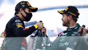 Checo Pérez y Sebastian Vettel celebrando en el podio de la Fórmula 1