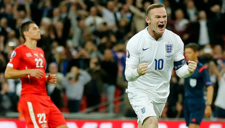 AP Rooney festeja un gol contra Suiza en la eliminatorias