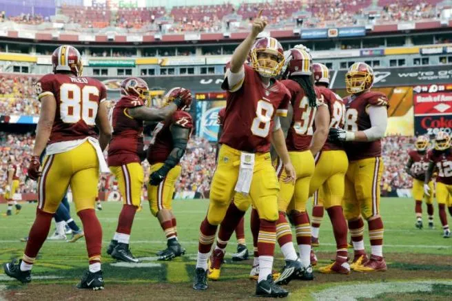 AP Kirk Cousins festeja touchdown de Washington
