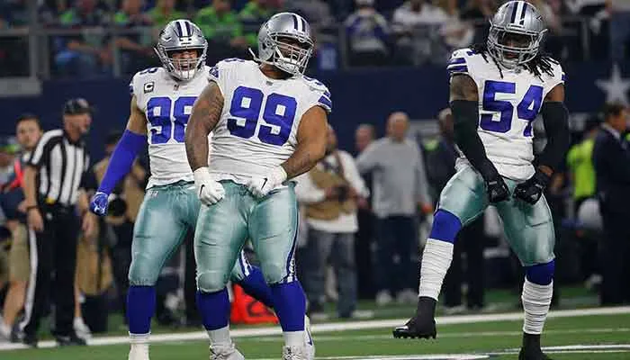 Jugadores de Cowboys festejando un TD