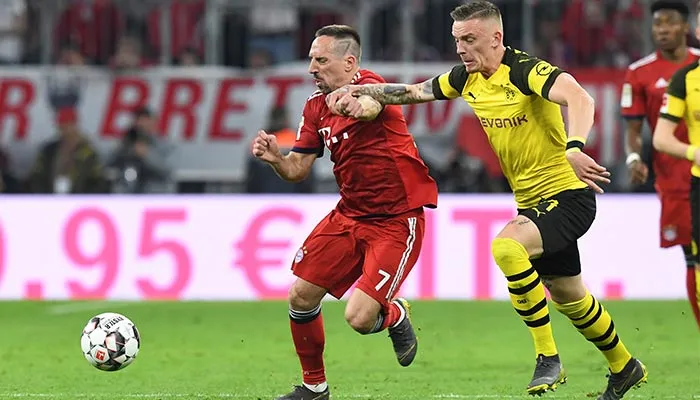 Ribery en disputa por el balón contra el Borussia