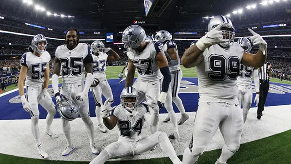 AP Cowboys festeja un TD la temporada pasada