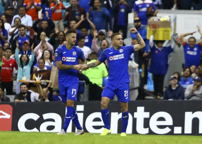 IMAGO7 Édgar Méndez y Jonathan Rodríguez en festejo de un gol