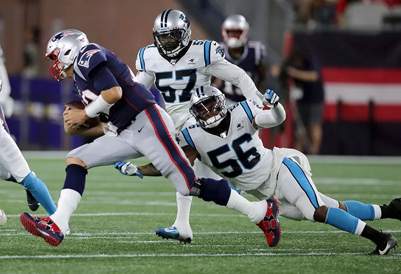 Tom Brady en acción contra los Panthers