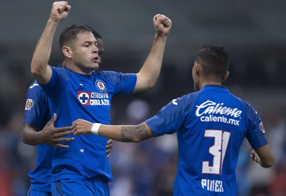 MEXSPORT Jugadores de La Máquina festejan una diana contra Rayados