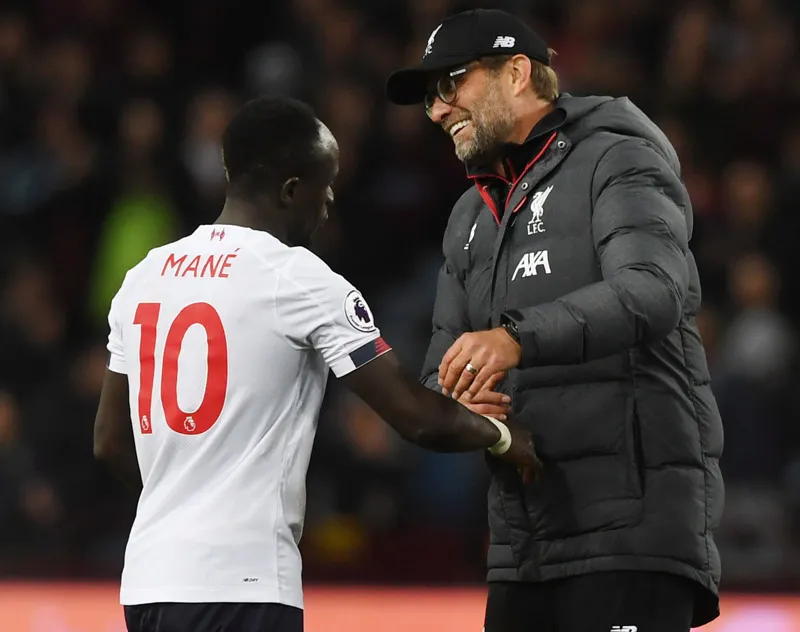 Mané y Klopp, tras un encuentro de Liverpool