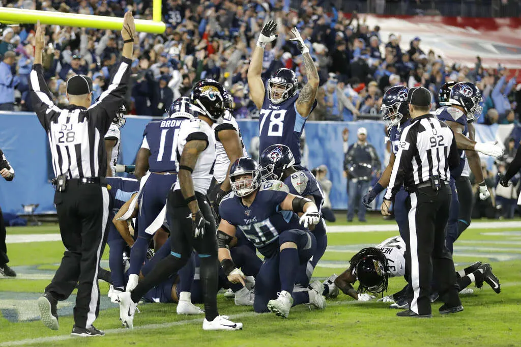 Jugadores de Titans festejan una anotación